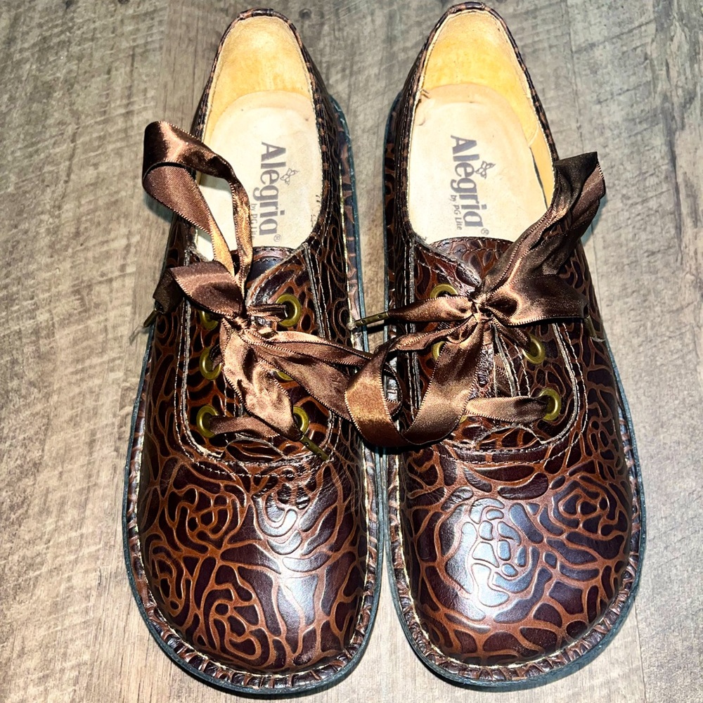 Alegria by PG Lite brown leather, rose embossed, rocker bottom shoe